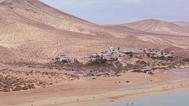 Aerial view of Sotavento beach in Jandia which is nine kilometer long virgin beach in Fuerteventura. Scenic Drone POV Exploration of Fuerteventura island.