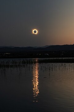 Full solar eclipse landscape, river landscape