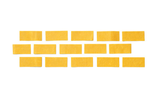 Yellow rectangular tiles arranged in staggered brick pattern on white background