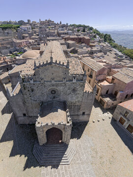 Stunning top-down aerial perspective of the Royal Cathedral Mother Church in Erice, ideal for Sicilian tourism publications, travel guidebooks, and architectural magazines.