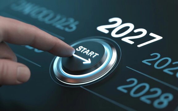 New year 2027 concept with a hand pushing start button