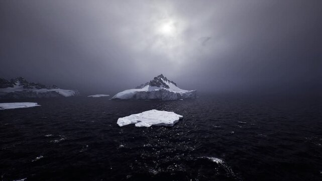 Research polar seascape with iceberg, sensor tracks and reflective water trail leading to distant mountain under cloudy sky, documentary analytical mood