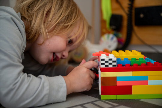 Young Child Playing and Building with Colorful Blocks &ndash; Learning, Creativity and Early Childhood Development
