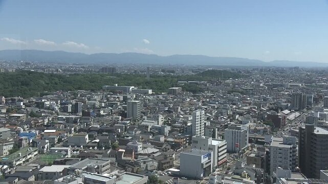 Footage panning across a bird's-eye view of Sakai City, Osaka, from left to right.