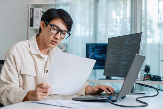 Developer software programmer computer coding screen working technology engineering monitor at modern workspace