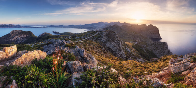 Sunset panorama with sea and mountain from Albercutx Watchtower in Mallorca, Balearic Islands, Spain