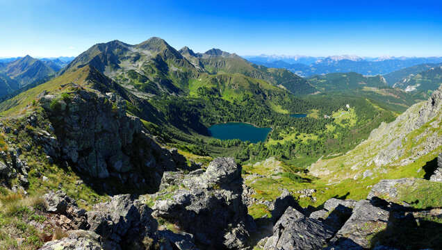Lake Grosser Scheibelsee from distance and peak Grosser B&ouml;senstein on horizon in the Hohe Tauern Mountains, Austria