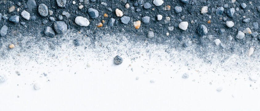natural stone pebble texture gradient scattering across pale negative space evokes organic wellness authenticity for spa branding web design advertising and editorial layout use
