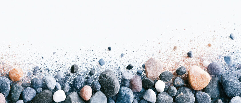 natural stone pebble texture gradient scattering across pale negative space evokes organic wellness authenticity for spa branding web design advertising and editorial layout use
