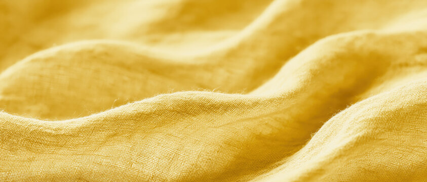 golden linen fabric texture macro closeup warm amber woven cloth background for sustainable wellness branding web design advertising packaging editorial natural organic backdrop
