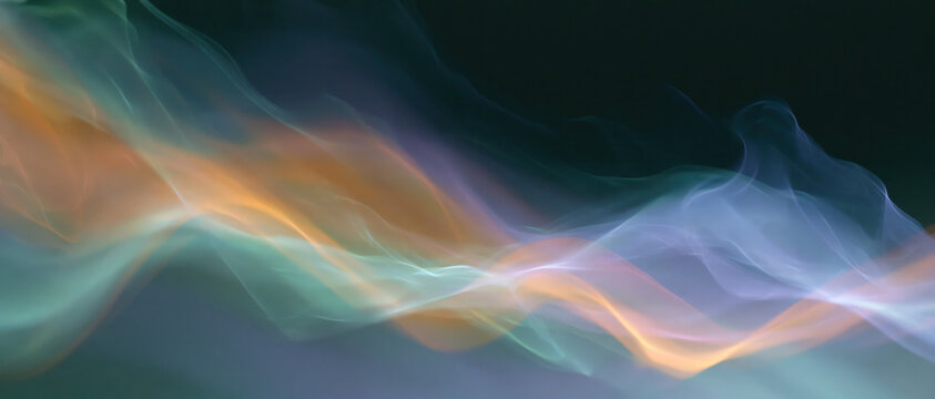 ethereal smoke waves swirling vibrant orange purple hues dark backdrop abstract fluid motion serene atmosphere digital art background web design advertising wellness branding
