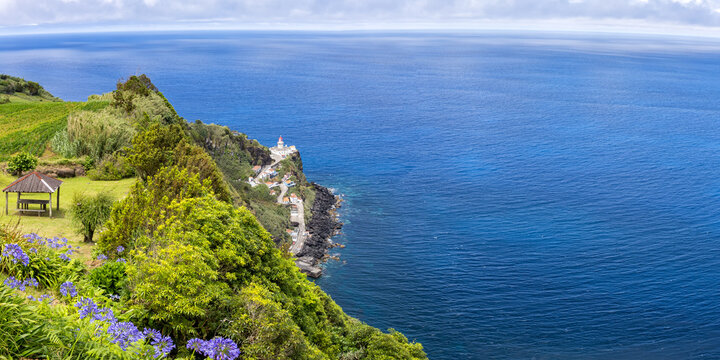 Azores view of Farol do Arnel lighthouse landscape nature panorama on Sao Miguel island in Portugal