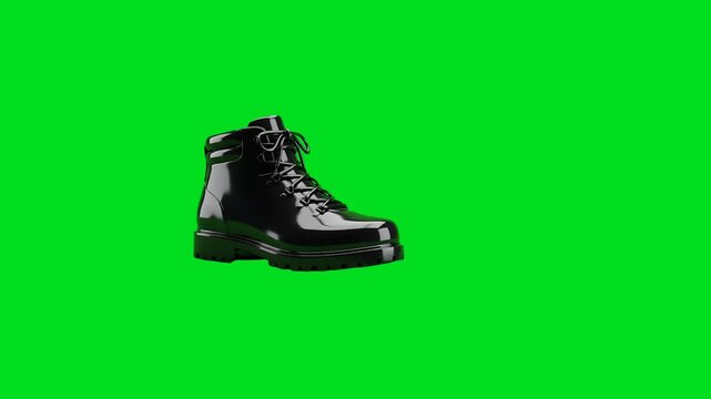 A sleek black leather hiking boot isolated on a vibrant green background