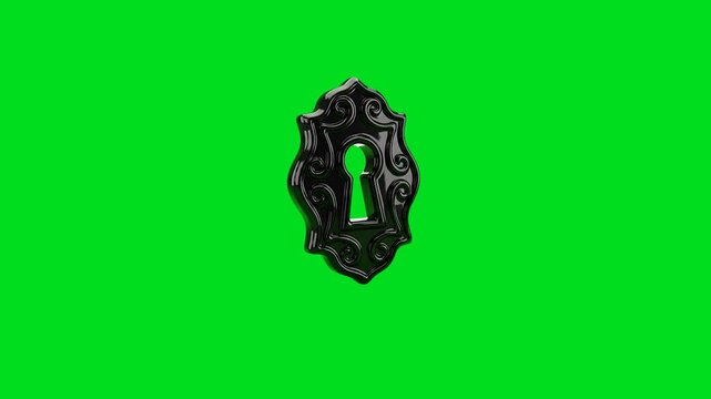 An ornate black vintage keyhole plate isolated on a bright green background