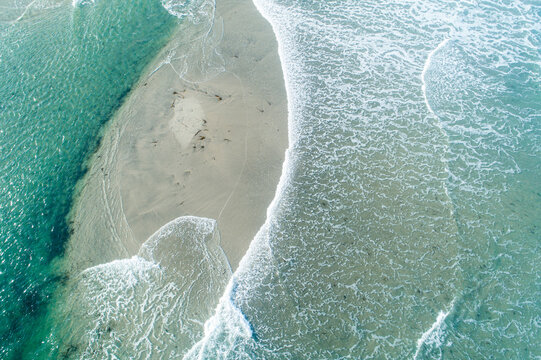 Top down drone shot of shallow beach The Concept of natural beauty