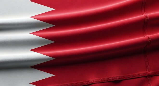 Macro shot of the Bahrain flag fabric highlighting the wrinkles and the vibrant red color tones.
