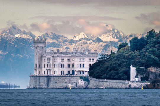 Trieste in winter. Between the sea, snow-capped mountains, and historic monuments.