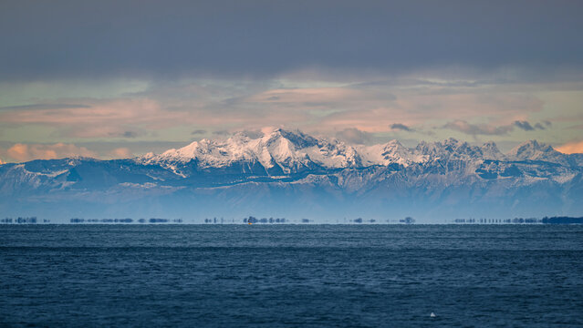 Trieste in winter. Between the sea, snow-capped mountains, and historic monuments.