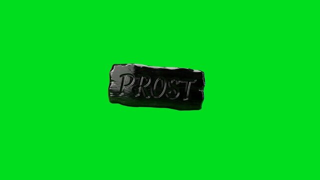 Black wooden plaque with the word prost engraved against a green backdrop