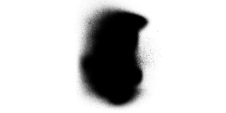 Black spray paint splatter texture with irregular profile-shaped blob on white background, abstract grunge dark silhouette with soft grainy edges for design overlay