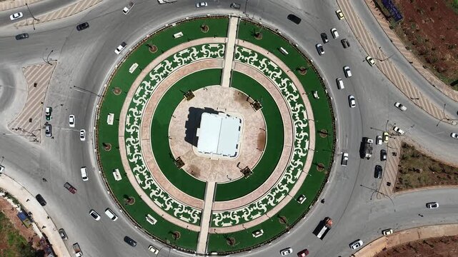 Drone view of a city landscape in Aleppo, Syria. Urban skyline and residential neighborhoods from above. City streets, infrastructure, and middle eastern architecture.