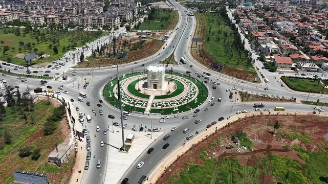 Drone view of a city landscape in Aleppo, Syria. Urban skyline and residential neighborhoods from above. City streets, infrastructure, and middle eastern architecture.