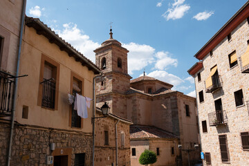 Fototapeta premium Historic church and traditional buildings in Sigüenza, Guadalajara, Spain