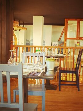 Empty restaurant tables during economic crisis and inflationDeclining restaurant customers due to rising food prices and cost of livingConcept of business loss and empty dining room due to high prices