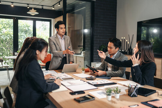 Business professionals team meeting discussion data analysis str