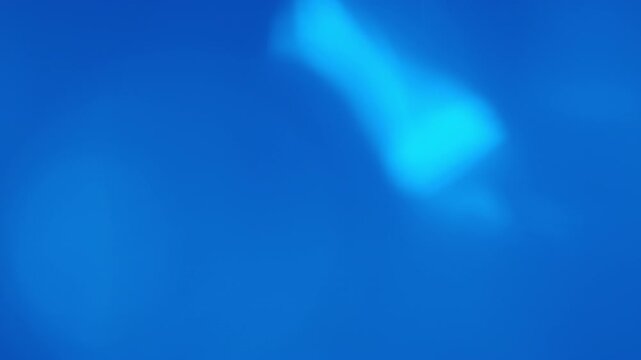 Blue light shimmering leak overlay with a veiling glow that emerges in the center, moves downward, then lifts upward