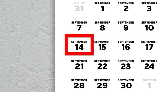 Red cursor highlighting September 14th on a 2026 wall calendar page