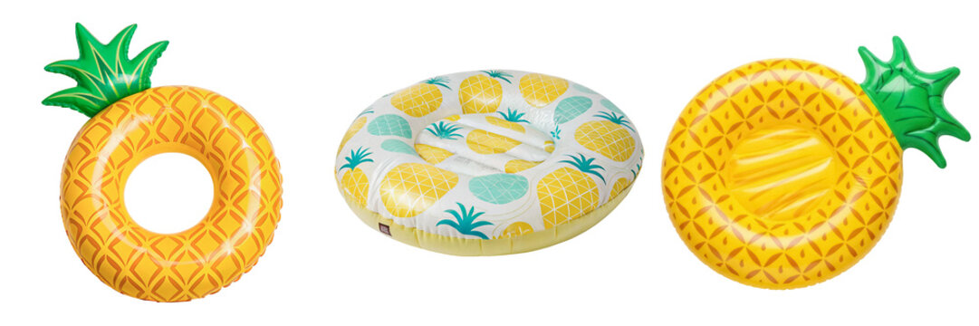 Three inflatable pineapple-shaped swimming rings on a white background