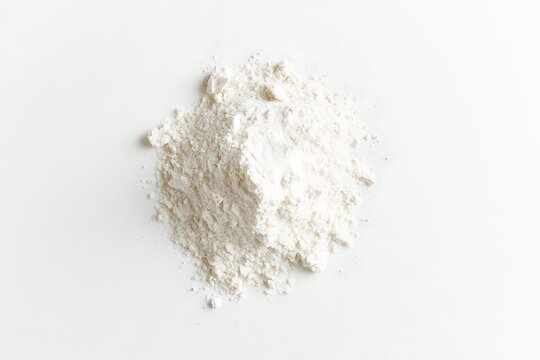 A heap of white wheat flour, isolated on white background