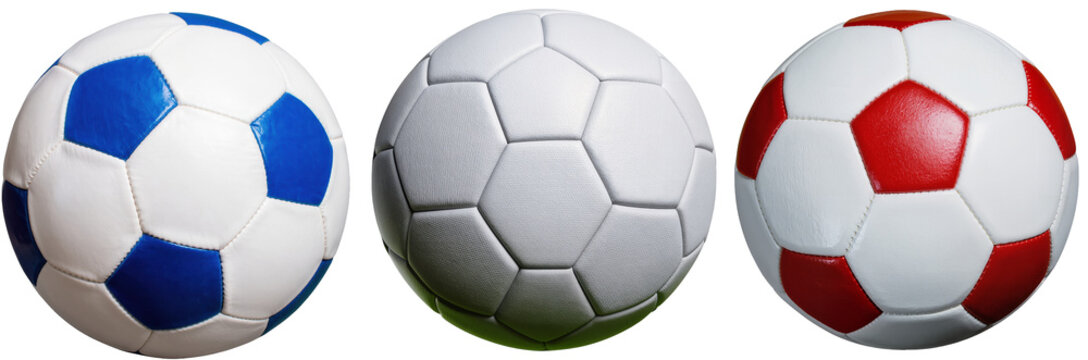 Three soccer balls, one blue and white, one all white, and one red and white, isolated on a white background.