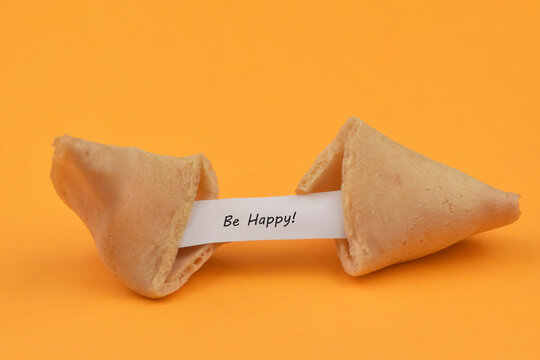 Chinese fortune cookies with text Be Happy inside