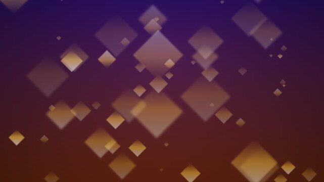Golden square bokeh particles floating across sunset background