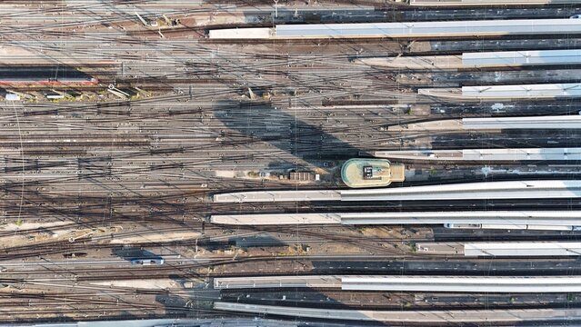 Aerial view of the complex railway tracks and platforms at the Frankfurt Central Station in the Bahnhofsviertel district of Frankfurt am Main, Hessen, Germany.