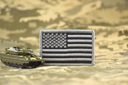The American patch on the military pixel background. The history of war financing and military support
