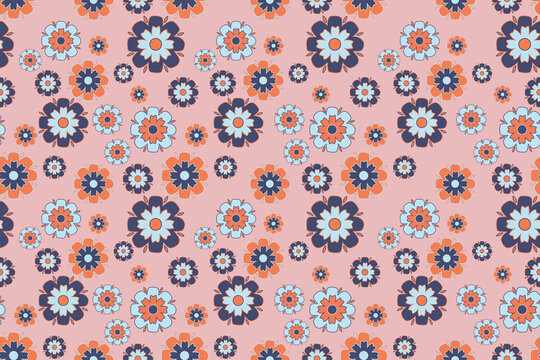 floral seamless pattern background. Cute flower motif design in pastel pink, navy, orange, and light blue. Perfect for fabric, textile print, wrapping paper, wallpaper, and stationery background.