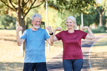 Fototapeta premium Portrait of a senior elderly woman and man, a couple, exercising outdoor, workout and training in park. Mature female and male person happy doing cardio exercise for health, walking or running outside