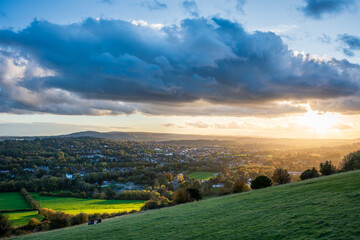 Fototapeta premium Beautiful Landscape image fo view from Box Hill in Surrey AONB during Autumn sunset