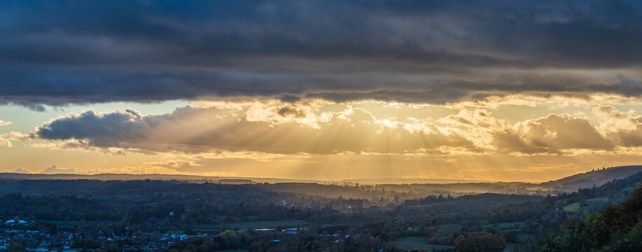 Beautiful Landscape image fo view from Box Hill in Surrey AONB during Autumn sunset