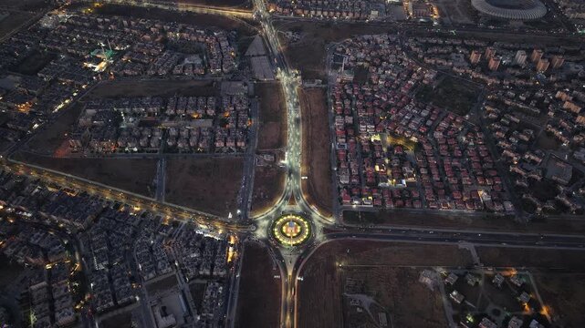 Drone view of a city landscape in Aleppo, Syria. Urban skyline and residential neighborhoods from above. City streets, infrastructure, and middle eastern architecture.