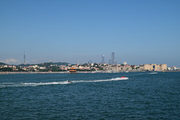 Fototapeta premium Coastal city skyline of Zhanqiao Pier, Qingdao, Shandong, China, classic Qingdao seaside landmark seascape