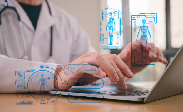 Male doctor wearing white cloth using stethoscope tablet and computer working diagram analysing patient diagnosis data with virtual heart icon in medicine and healthcare concept