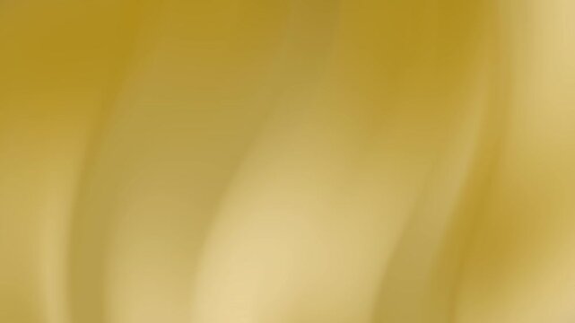 Gold gradient blurry abstract golden light swirls with soft flowing movements create a stunning effect.