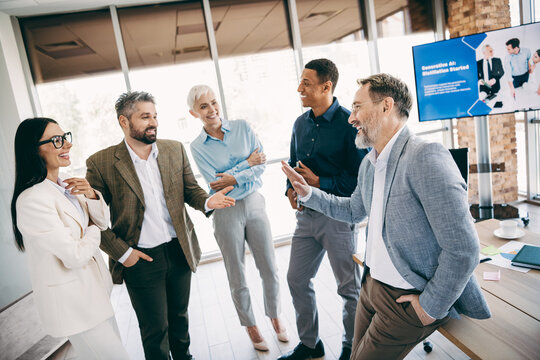 Diverse colleagues sharing moments of teamwork and discussion in a modern office environment during a collaborative meeting