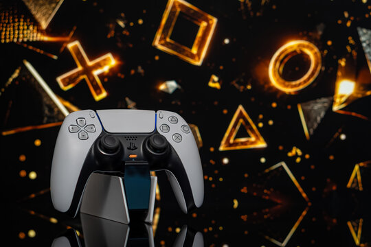 August 6, 2026, Odessa, Ukraine.  PlayStation 5 controller on golden background
