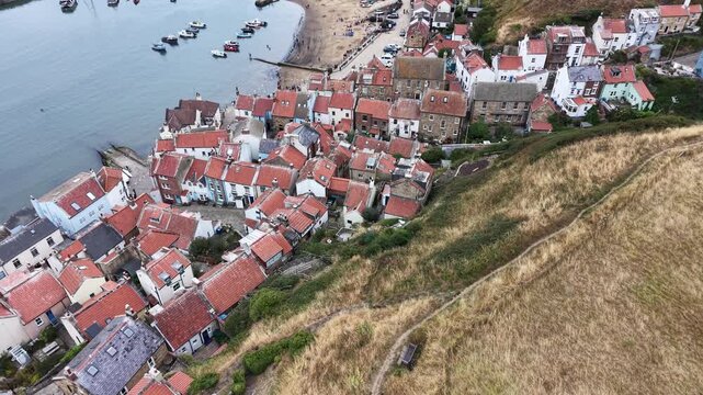 aerial view of Staithes seaside village and fishing port in the borough of Scarborough in North Yorkshire, England