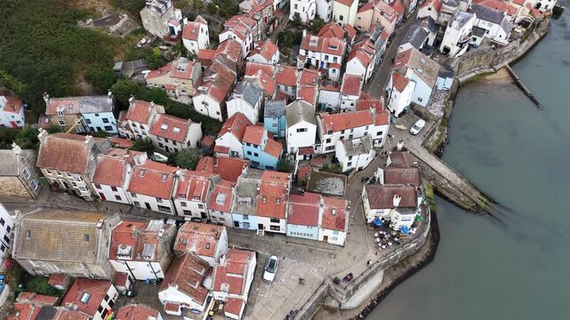 aerial view of Staithes seaside village and fishing port in the borough of Scarborough in North Yorkshire, England